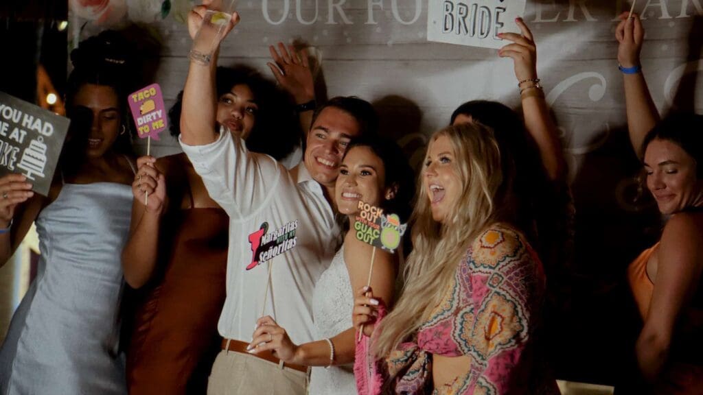 Friends celebrating at a carefree destination wedding reception